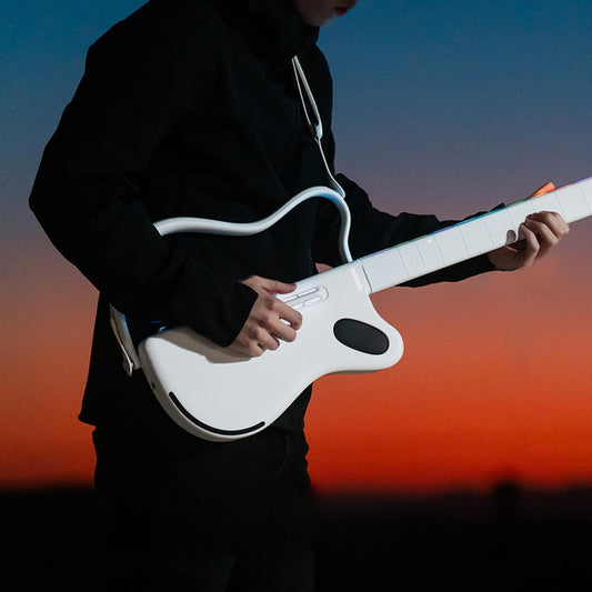 🎸Stringless Smart Guitar, No Strings Attached, Hundreds of Instrument Presets, Onboard Speaker, Foldable, Detachable